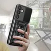 A hand holding a black phone case with a ring holder and camera cover. Produktbild-Vorschau