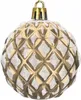 A single gold Christmas ornament with a diamond pattern and glitter accents, hanging from a gold cap. Anteprima dell’immagine prodotto