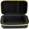 An open black and yellow storage case with foam padding inside. Podgląd zdjęcia produktu