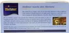 A close-up view of the back of a Meßmer tea box with marketing text and a small image of a building. Produktbild-Vorschau