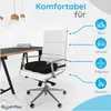 A black orthopedic seat cushion is placed on a white office chair next to a desk. Icons and text indicate its use in various settings like an office, car, airplane, and wheelchair. Produktbild-Vorschau