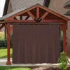 A brown outdoor curtain hangs from a wooden gazebo, providing privacy and shade in a backyard setting. Produktbild-Vorschau