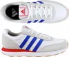 A top-down and side view of a pair of Adidas sneakers. Voir les images du produit