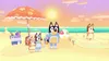 A family of dogs on a beach at sunset, with an umbrella and beach toys. Náhled obrázku produktu