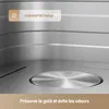 Close-up of the interior of a stainless steel appliance, possibly an oven or air fryer. Anteprima dell’immagine prodotto
