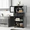 A black bathroom cabinet with its doors and drawers open, displaying various items inside, placed in a modern bathroom setting. Náhled obrázku produktu