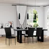 A dining room with a table and chairs set up for a meal. Produktbild-Vorschau