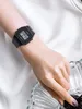 A person's arm wearing a black Casio watch, with a bowl of berries in the foreground. Anteprima dell’immagine prodotto