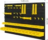 A black pegboard tool organizer with yellow bins and hooks, displaying dimensions. Voir les images du produit