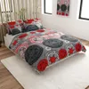 A bedroom scene with a bed made up with a patterned duvet and pillows. Produktbild-Vorschau