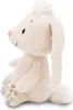 A side view of a plush toy bunny sitting down. Produktbild-Vorschau