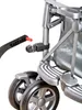 A close-up view of a stroller accessory attachment mechanism. Náhled obrázku produktu