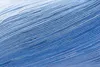 A close-up, diagonal view of a skein of yarn with a gradient of blue and white colors. Produktbild-Vorschau