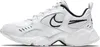 A side view of a white Nike Air Heights women's sports shoe with black accents. Voir les images du produit