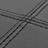 Close-up shot of black material with stitching. Podgląd zdjęcia produktu