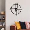A modern living room with a wall clock and a bookshelf. Produktbild-Vorschau