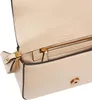 A close-up view of the interior of a beige handbag, showing the zipper and a small pocket. Podgląd zdjęcia produktu