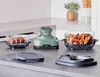 Kitchen counter with cooking appliances and food. Anteprima dell’immagine prodotto
