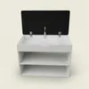 A white shoe cabinet with a black lid open, showing two shelves below. Produktbild-Vorschau
