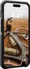 A smartphone in a black case is placed on a background of dry grass, with a bicycle and two water bottles visible. Anteprima dell’immagine prodotto
