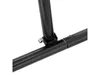 A close-up view of a black metal frame with a bolt and nut connecting two pieces of tubing. Voir les images du produit