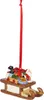 A Christmas ornament of Santa Claus and gifts on a sled. Náhľad obrázku produktu