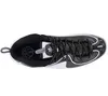 A top-down view of a black and white Nike Air Penny 2 sneaker. Podgląd zdjęcia produktu