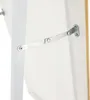 A close-up view of a metal hinge mechanism attached to a white surface and a wooden edge. Náhľad obrázku produktu