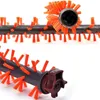 Close-up view of two vacuum cleaner brush rolls with orange bristles. Produktbild-Vorschau