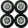 Four LEGO Technic tires with rims, arranged in a 2x2 grid. Náhled obrázku produktu