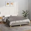 A bed with a gray weighted blanket and white bedding, set in a bedroom with artwork on the wall and a plant. Produktbild-Vorschau