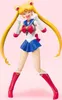 A Sailor Moon action figure posed against a pink background. Produktbild-Vorschau