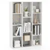 A white, multi-compartment bookshelf filled with books and decorative items, presented against a white background. Produktbild-Vorschau