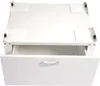 A white washing machine pedestal with an open drawer, shown from a slightly elevated front-left angle against a white background. Náhľad obrázku produktu