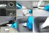 Collage of images showing a blue and white 12V car vacuum cleaner being used in various car interior locations, including the cigarette lighter socket, under the seats, and in storage compartments. Náhled obrázku produktu