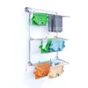 A wall-mounted drying rack with clothes hanging on it. Anteprima dell’immagine prodotto