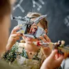 Two children are building and playing with LEGO Star Wars sets. Náhled obrázku produktu