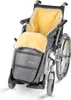 A wheelchair with a warm, fluffy liner and footrest cover. Produktbild-Vorschau