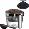 A coffee grinder with coffee beans and a scoop. Produktbild-Vorschau