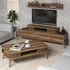 A living room setting with a TV stand, coffee table, and sofa. Náhľad obrázku produktu