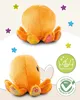 Two views of an orange plush octopus toy, surrounded by colorful stars and marketing icons. Produktbild-Vorschau