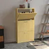 A light wood shoe cabinet with two drawers and a flip-down compartment is shown in a room. Podgląd zdjęcia produktu