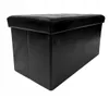 A black storage ottoman is shown against a white background. Podgląd zdjęcia produktu