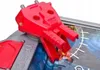 Close-up of a red toy cannon attachment for a board game. Anteprima dell’immagine prodotto