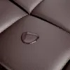 A close-up of a brown leather surface with a water droplet. Produktbild-Vorschau
