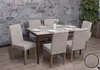 A dining set with a table and six chairs against a stone wall. Podgląd zdjęcia produktu