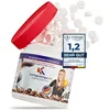 A bottle of cleaning tablets for coffee machines, with the lid open and tablets scattered around. Produktbild-Vorschau