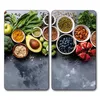 A collection of healthy foods arranged on a dark gray surface. Podgląd zdjęcia produktu