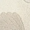 Close-up view of a textured rug with a pattern. Produktbild-Vorschau