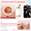 A collage of images showcasing a children's vanity table with a mirror, makeup items, and safety features. Voir les images du produit